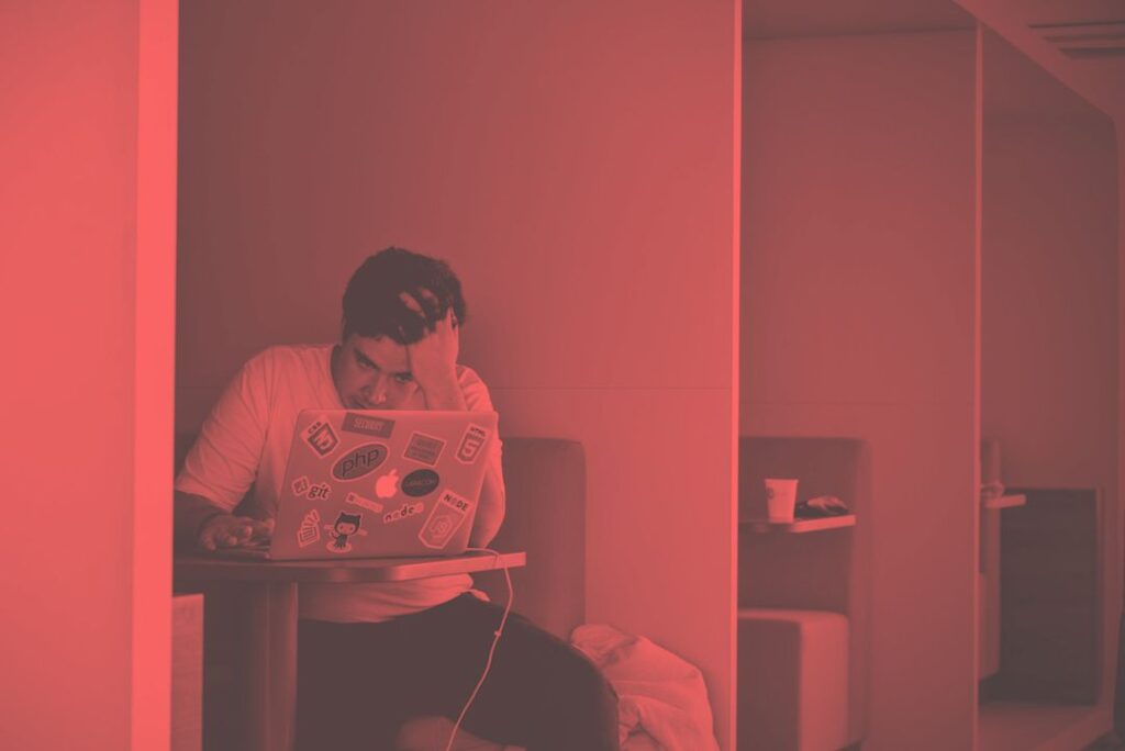 AI-powered grant writing tools helping professionals draft a proposal on a laptop